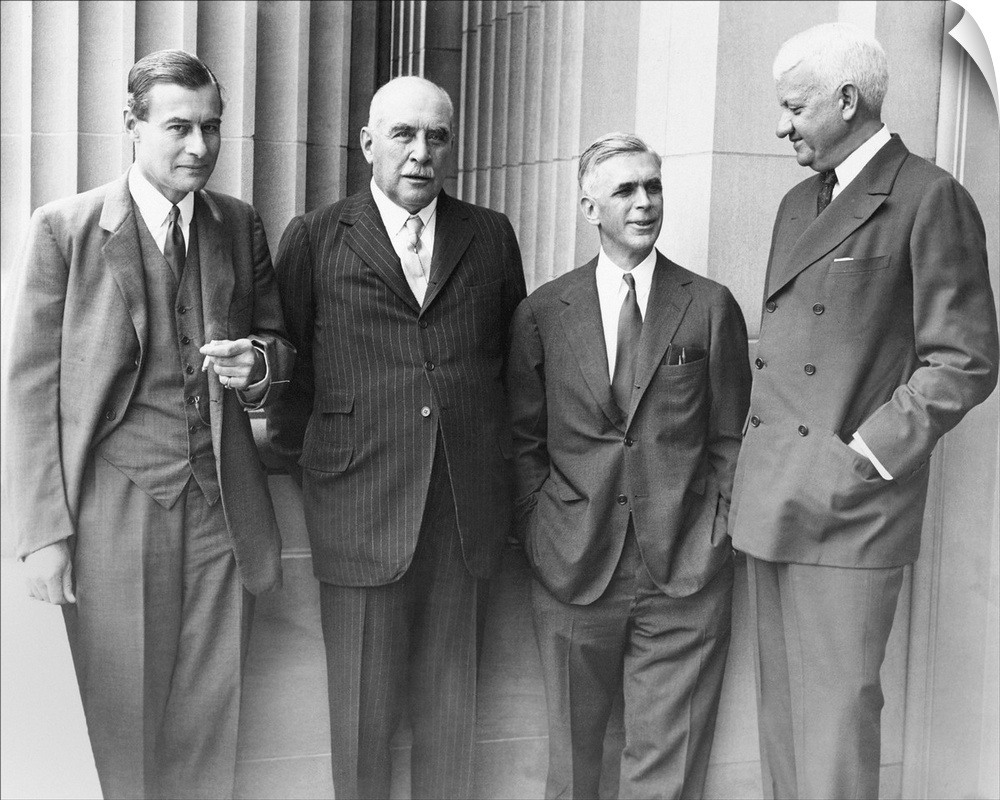 J.P. Morgan Jr. with a few of his partners at the Senate Banking and Currency Committee hearings. May 31, 1933. L-R: Juliu...