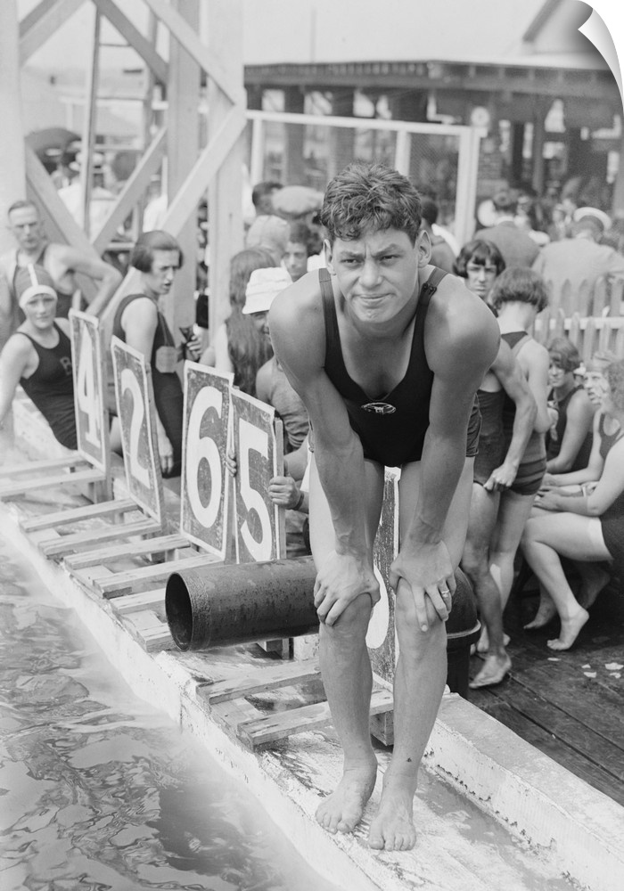 Johnny Weissmuller at competitive swimming event in the 1920s. After winning five Olympic gold medals and one bronze medal...