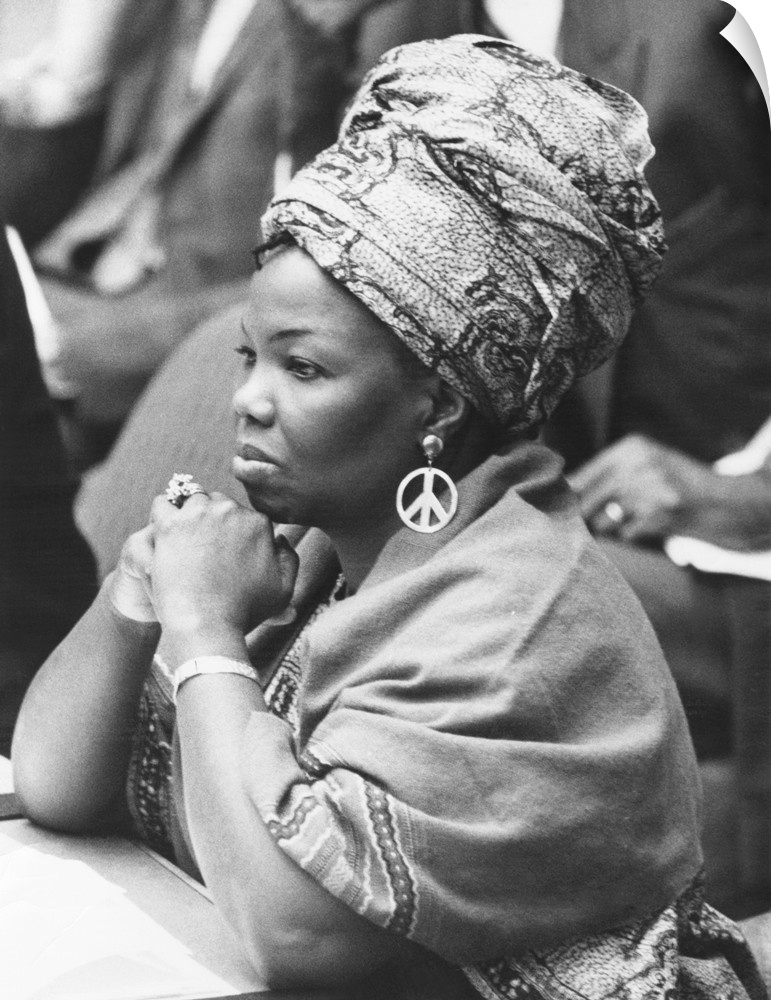 Mrs. Jeanne Martin Cisse, wears peace symbol earrings at the U.N. Security Council. Nov. 16, 1972. She was Guinea's Ambass...