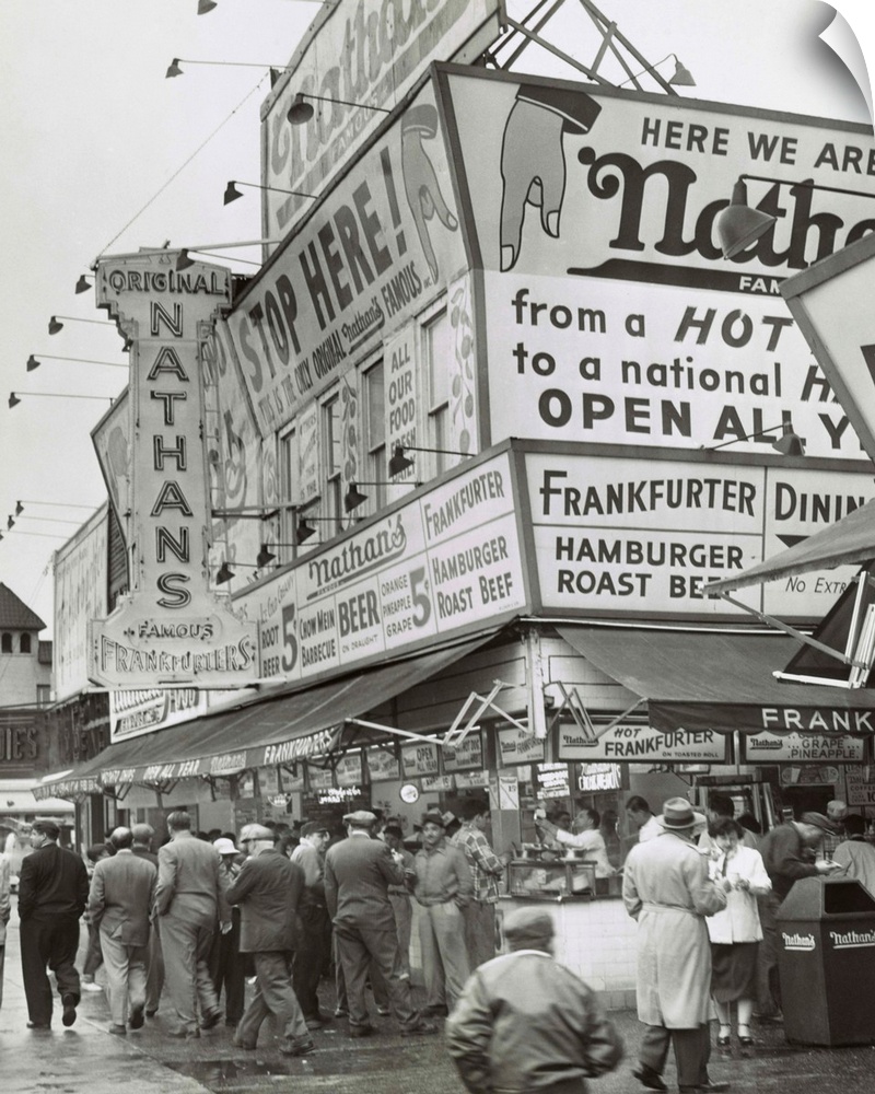 Nathan's Hot Dogs food stand on the Coney Island Boardwalk, May 11, 1954. Brooklyn, New York City.