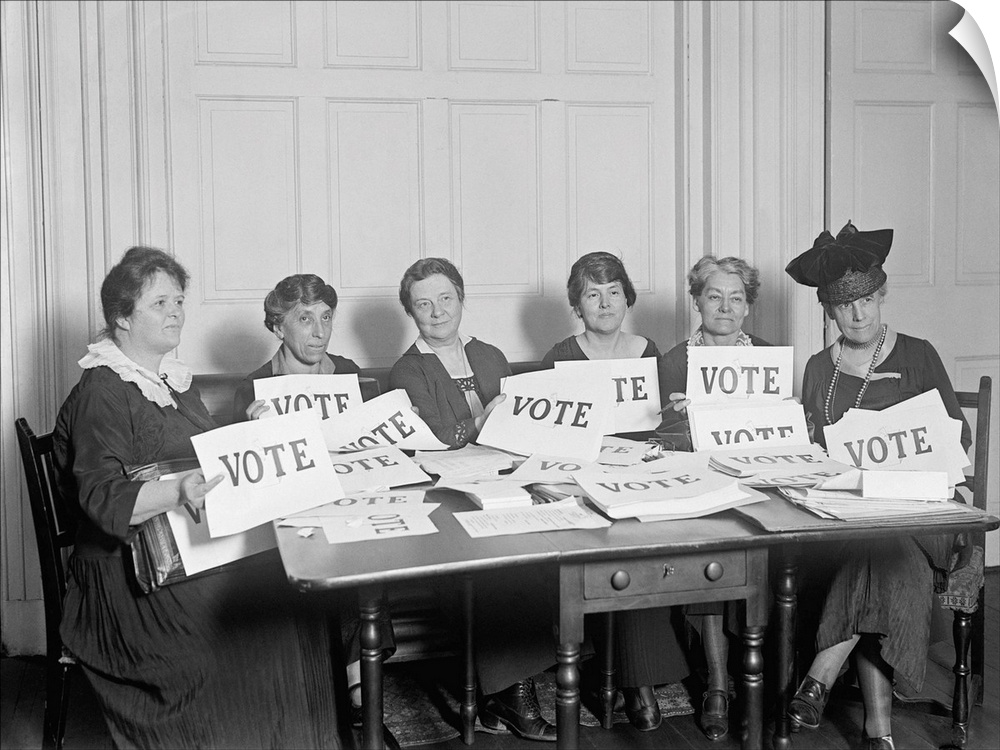 National League of Women Voters hold up signs reading, 'VOTE', Sept. 17, 1924. Millions of women voted in 1920 and 1924, b...