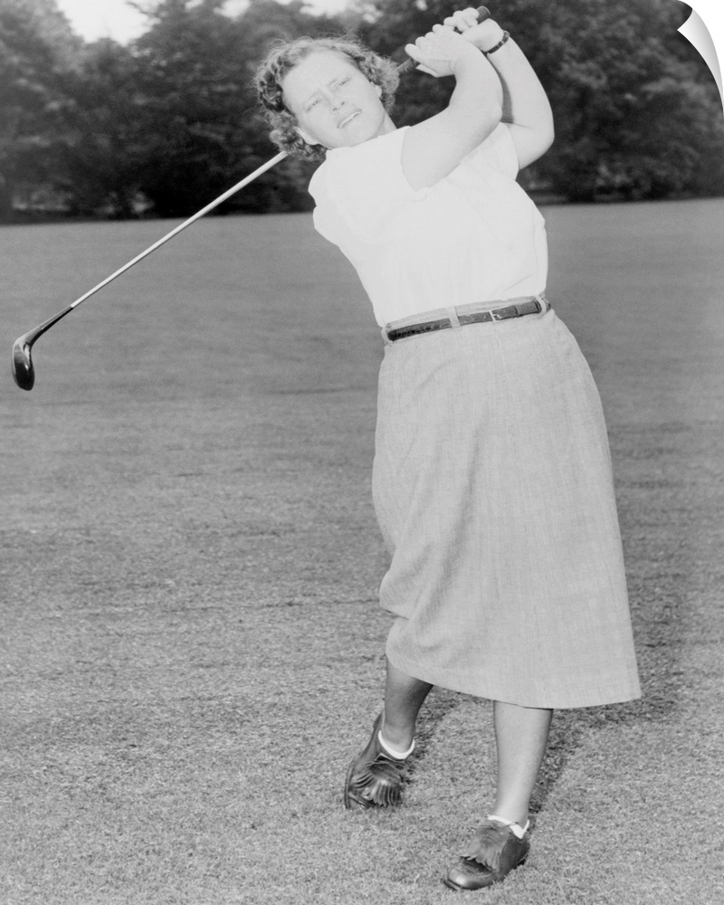 Patty Berg playing golf in 1951. She was a founding member and player on the LPGA Tour. She won 15 major titles from 1940 ...