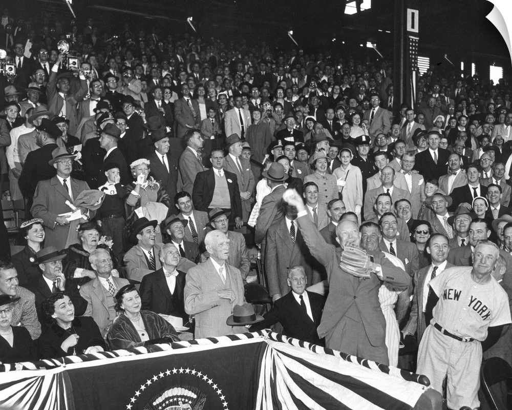 President Eisenhower throwing out the first ball of the 1954 Baseball season at Griffith Stadium. At left is Casey Stengel...