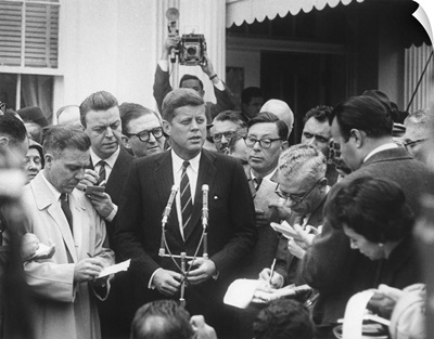 President-elect John Kennedy speaks to reporters outside the White House