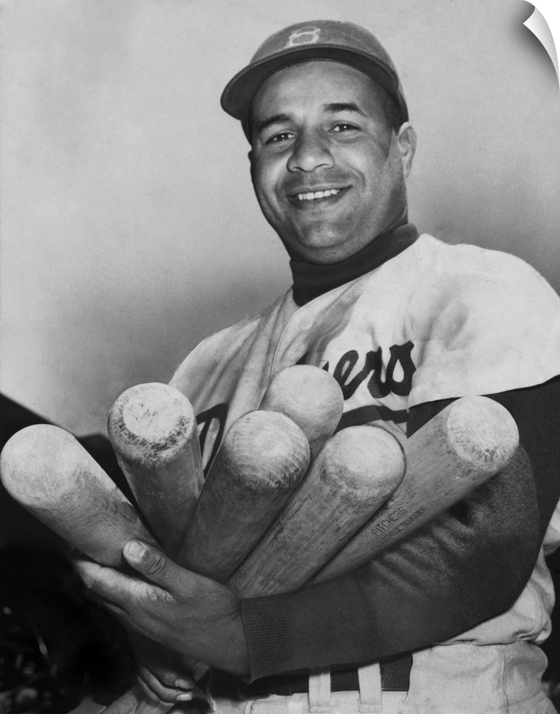 Roy Campanella, catcher for the Brooklyn Dodgers, holding six bats, June 4, 1953. He was one of the first Major League Bas...