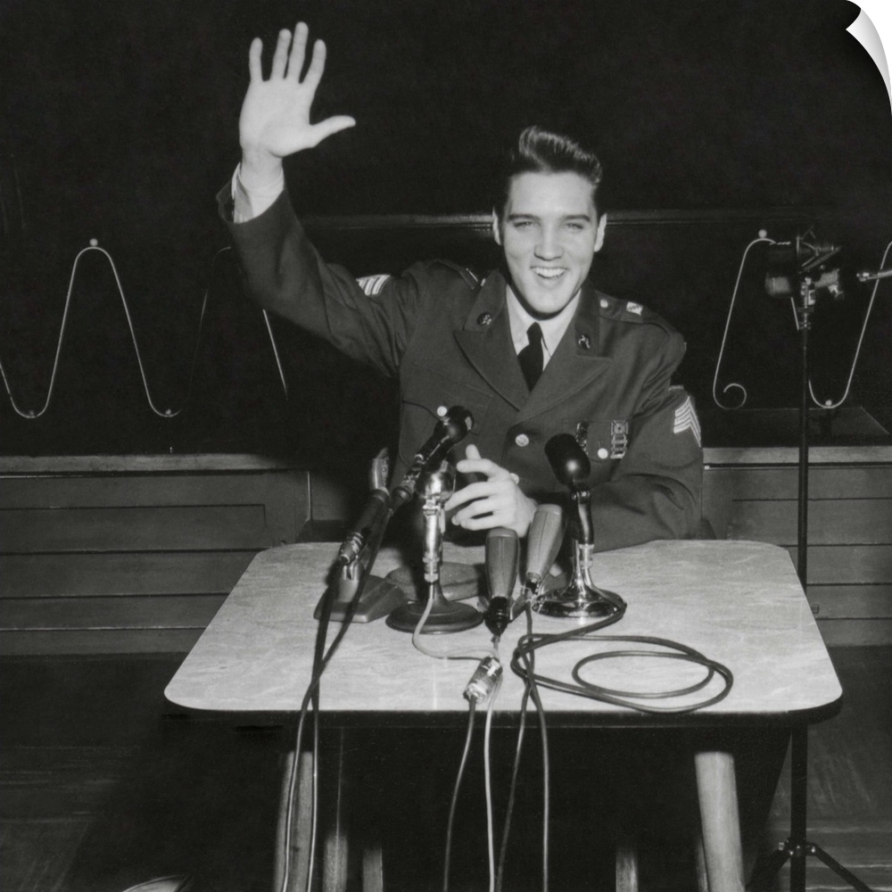 Sgt. Elvis A. Presley answers question for the civilian and military press. March 1, 1960. When asked why he served as a r...