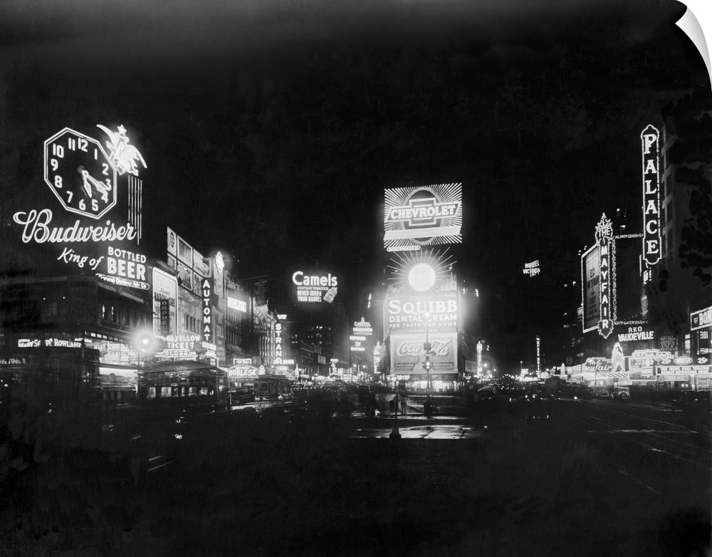 Times Square north at night, New York City, Jan. 1934. Lighted signs advertise theaters, Burlesque and Vaudeville houses, ...