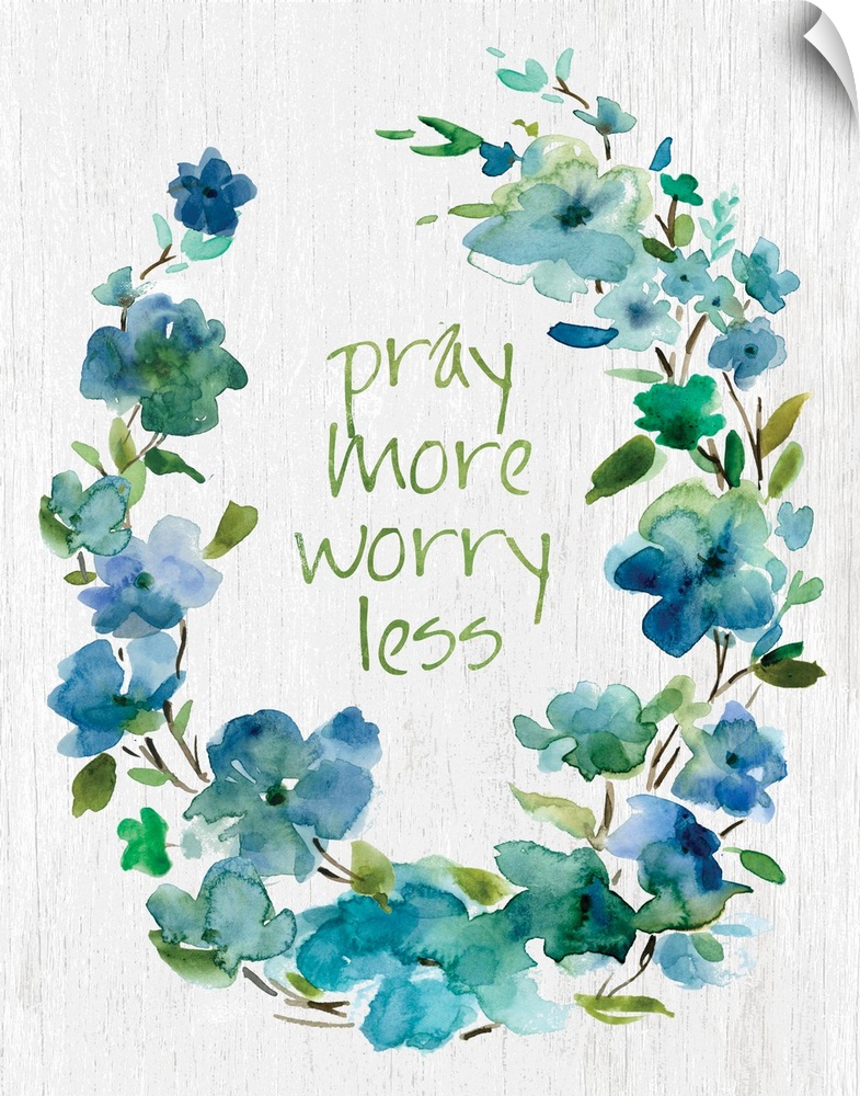 "Pray More, Worry Less" placed on white textured background with blue flowers surrounding it.