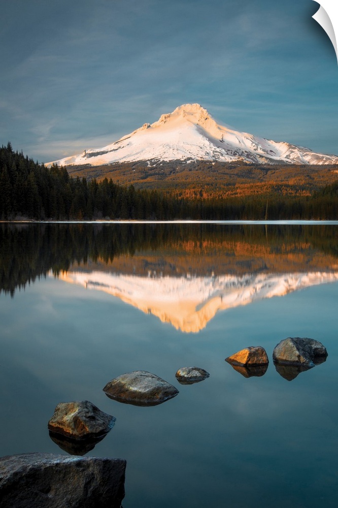Snow-capped Mount Hood reflected in the lake below at sunset, Oregon.