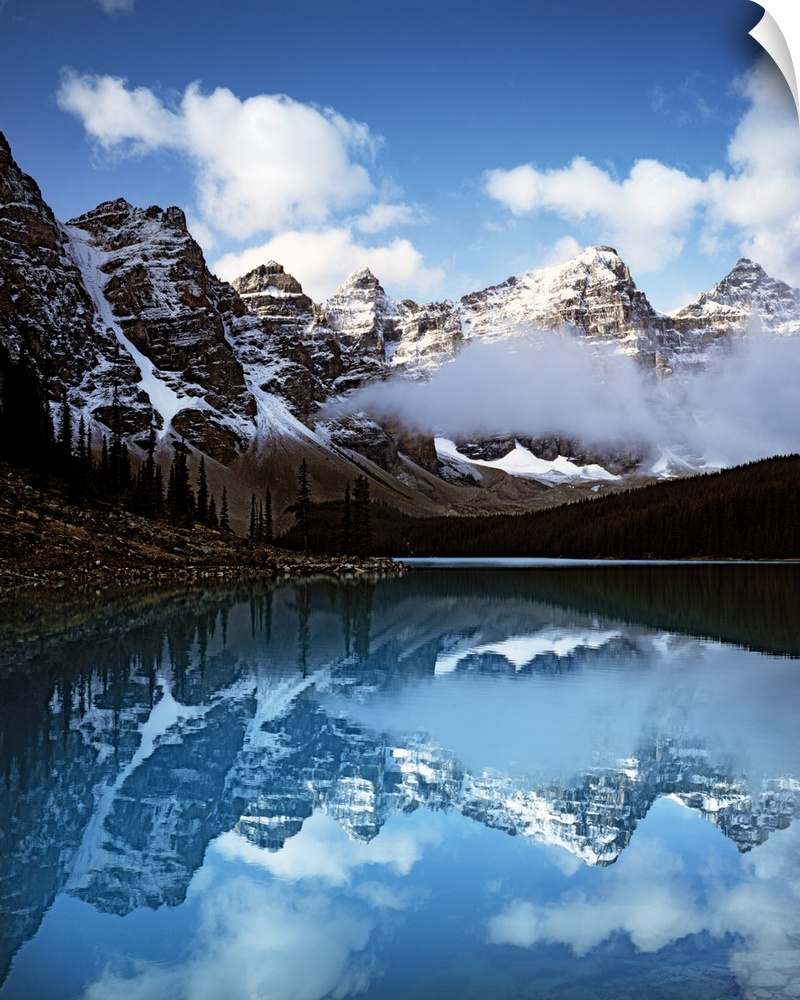 Moraine Lake surrounded by snow-capped mountains in Banff National Park, Alberta, Canada.