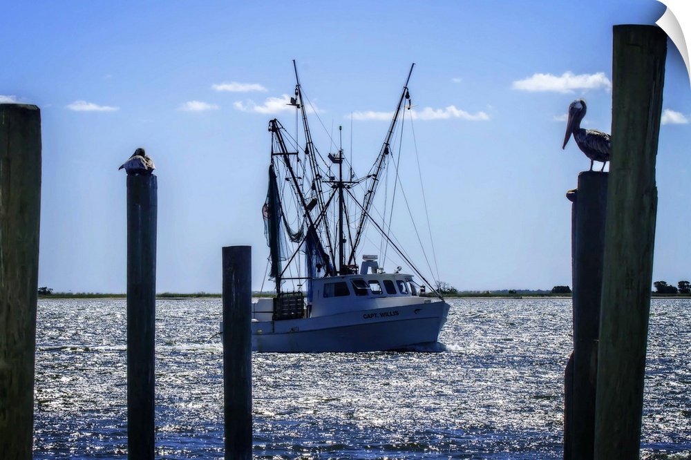 A fishing boat on the water near tall wooden posts.