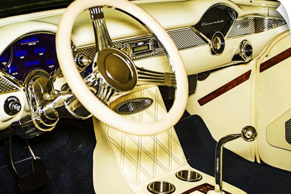 Fine art photograph of the white leather dashboard and console of a vintage car.