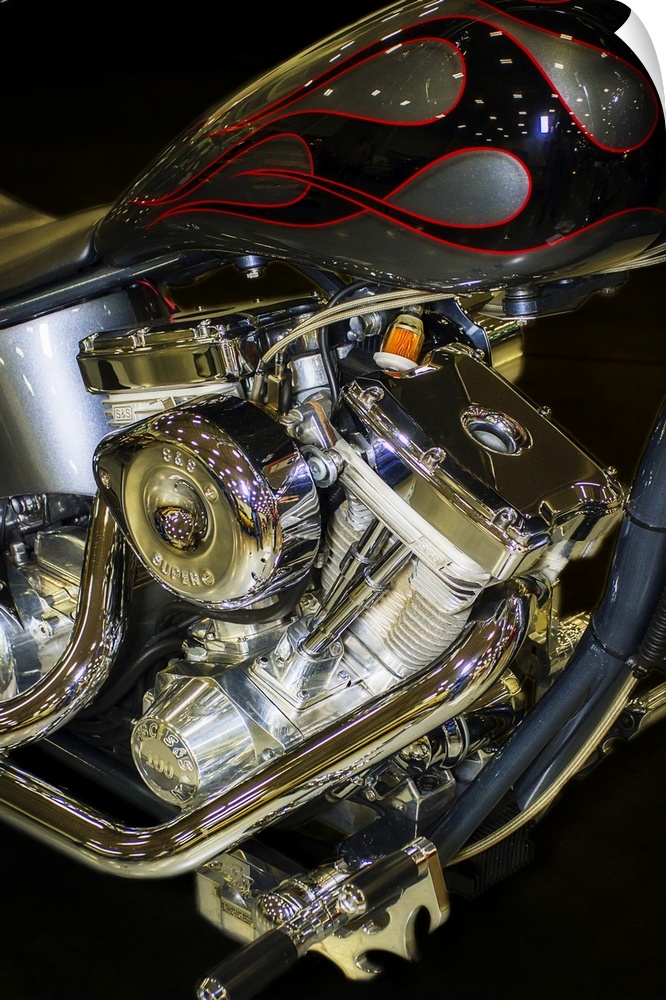 Fine art photograph of the engine and pipes of a vintage motorcycle.