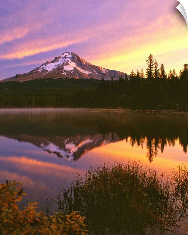 Mount Hood at sunset reflected in a lake.