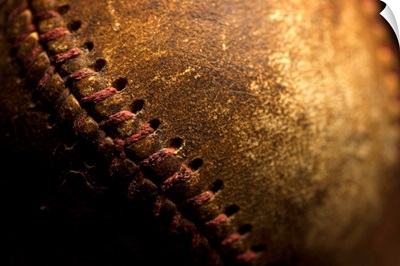 A closeup of an old baseball