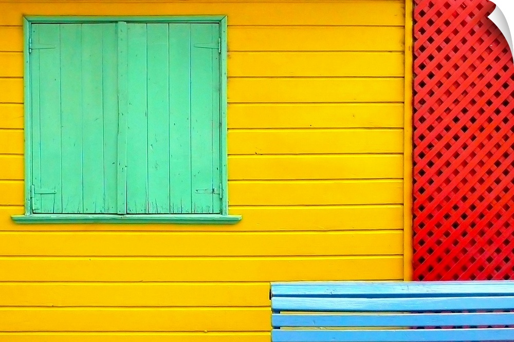 Landscape photograph on a big canvas of a vibrant space of Caminito in La Boca, in Buenos Aires, showing a window with gre...