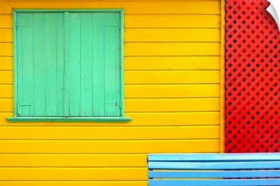 A colorful detail of Caminito in La Boca, Buenos Aires, showing green shutters