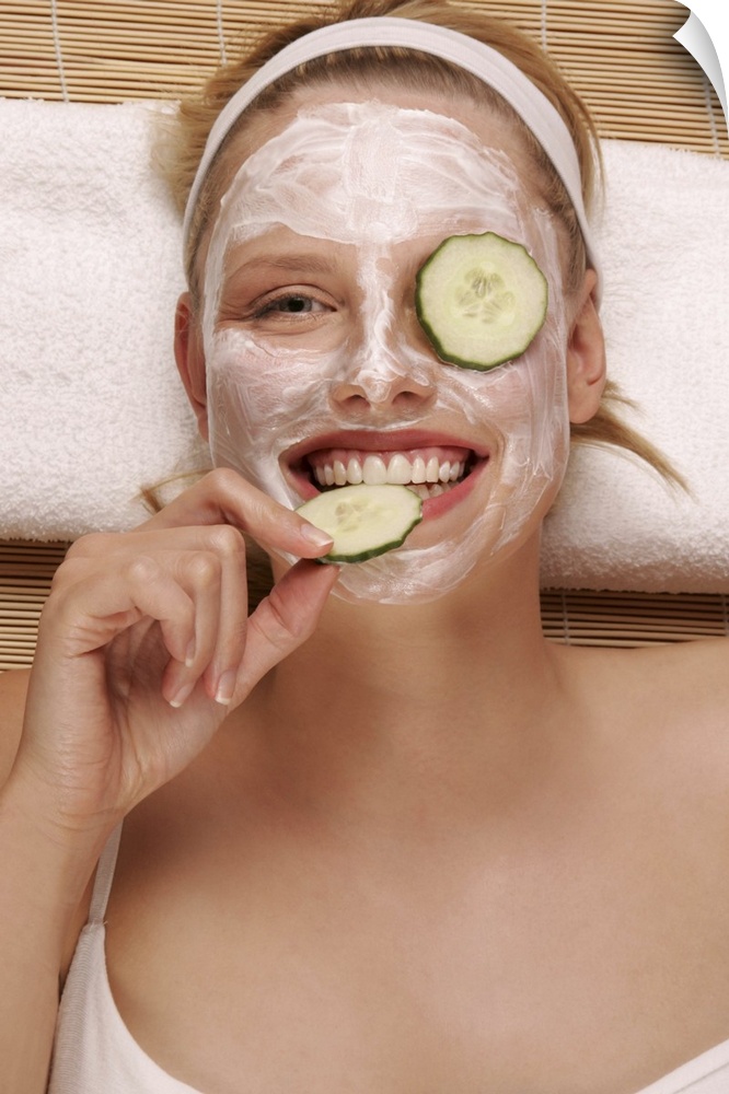 A young woman with a face pack.