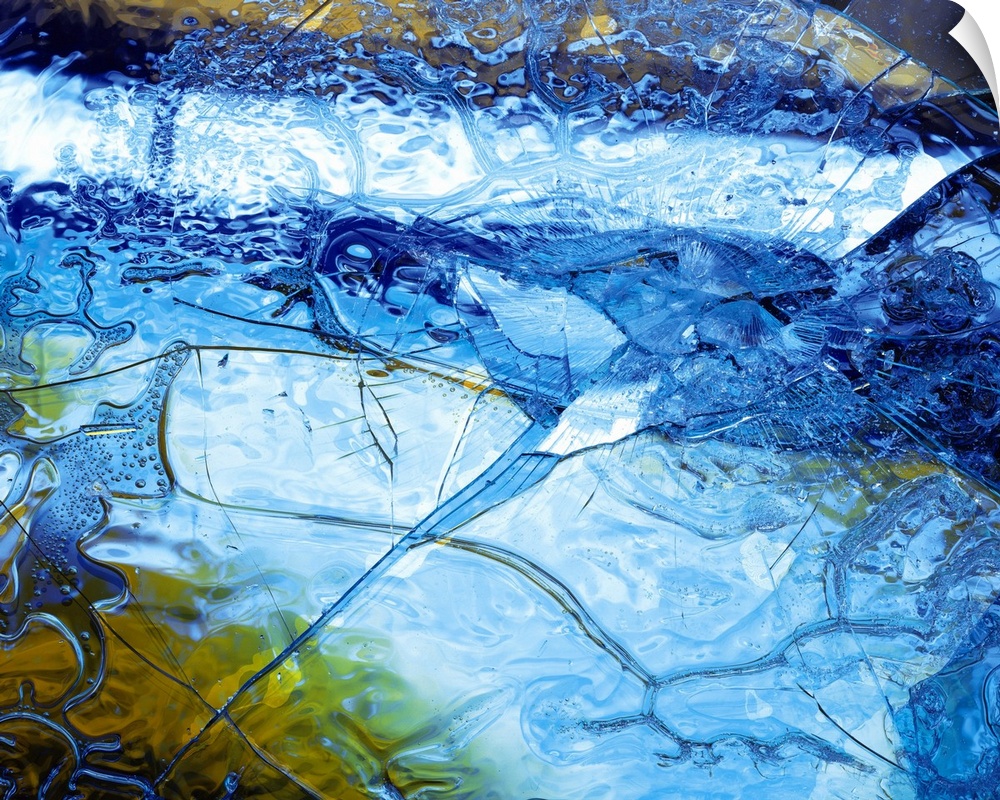 Abstract artwork of a sheet of ice that has cracked and been shattered in one spot.