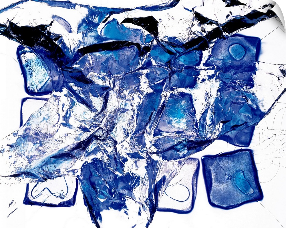Abstract photo of several translucent plastic items being splashed with water on a white background.
