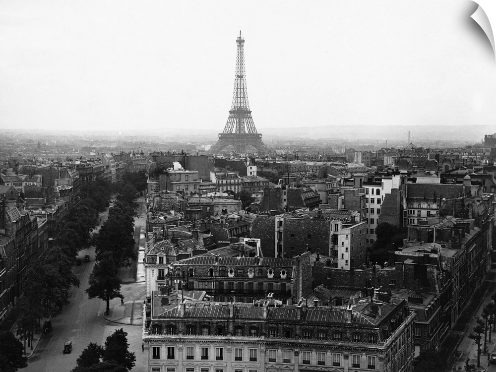 View of the Eiffel Tower and surrounding buildings, taken from the top of the Arc de Triomphe.