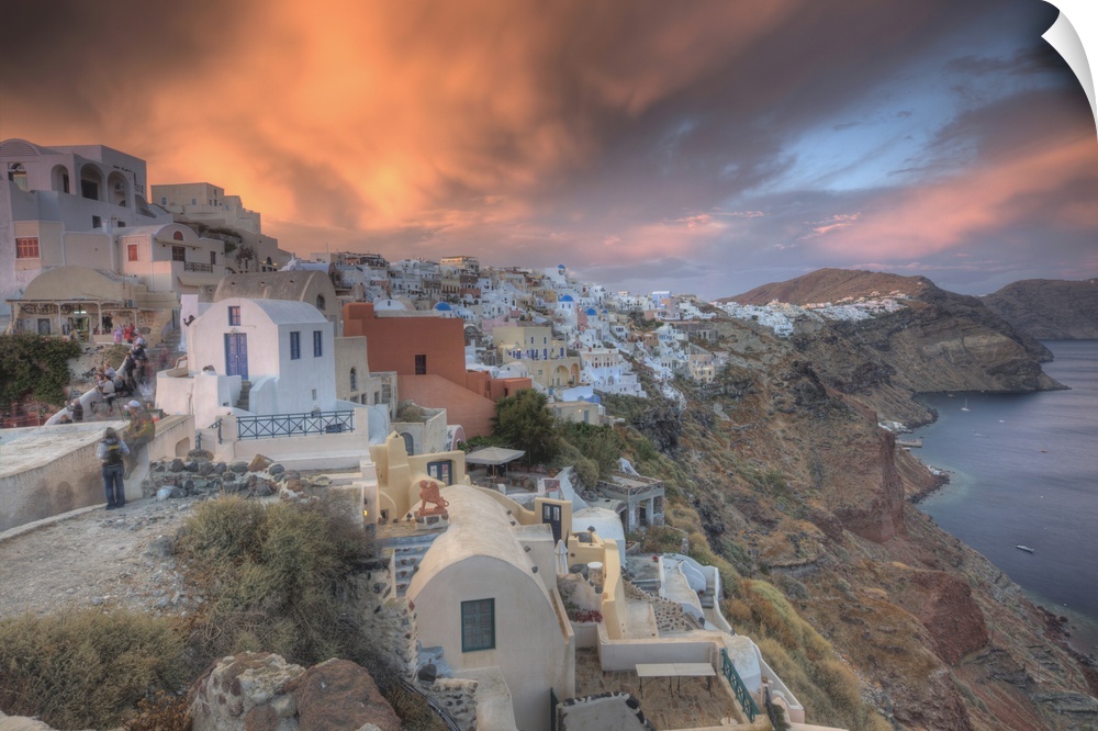 Along the cliff of Oia, houses have been delved into the porous volcanic rock. In the evening hordes of people arrive simp...
