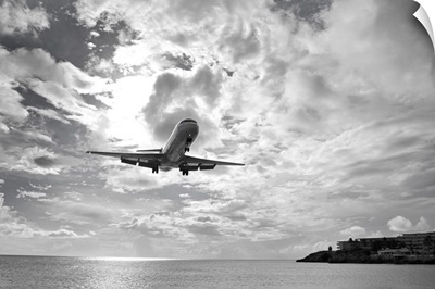 An airliner comes in for a landing in St Maarten, Netherlands Antilles.