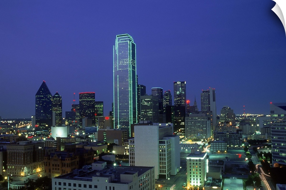 Bank of America outlined in green neon at dusk, Dallas, TX