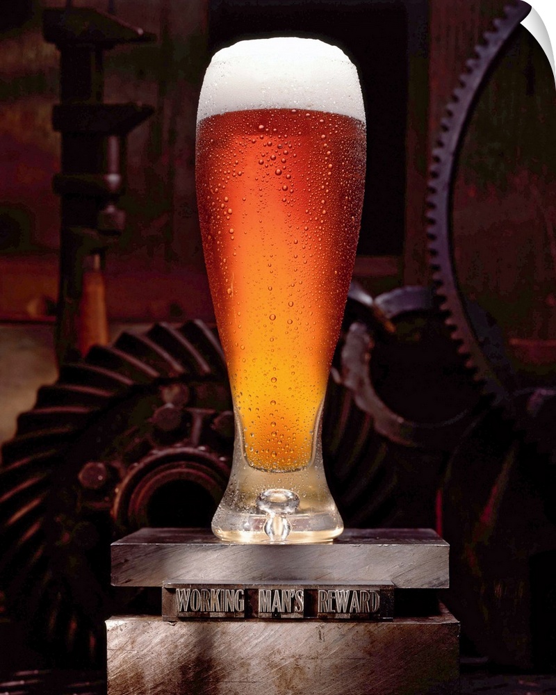 Vertical, large wall picture of a tall glass of beer, foaming at the top, sitting on a platform that reads "Working man's ...