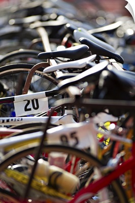 Bicycles on the rack at a triathlon race ready for their racers