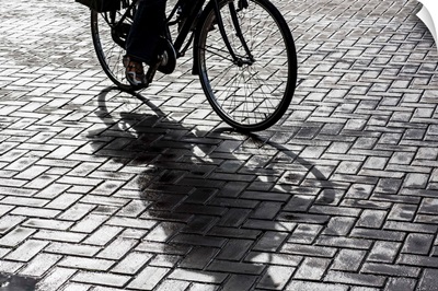 Bike rider on streets of Amsterdam