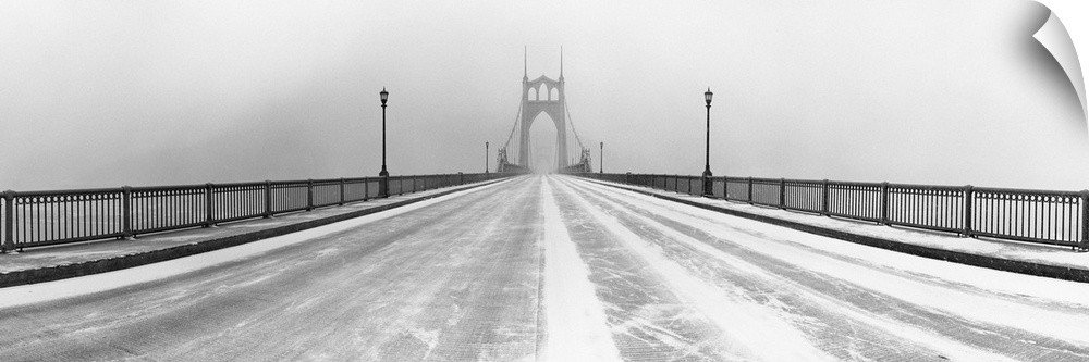 Black and white panorama of St.Johns Bridge in Portland, Oregon in winter snow storm.