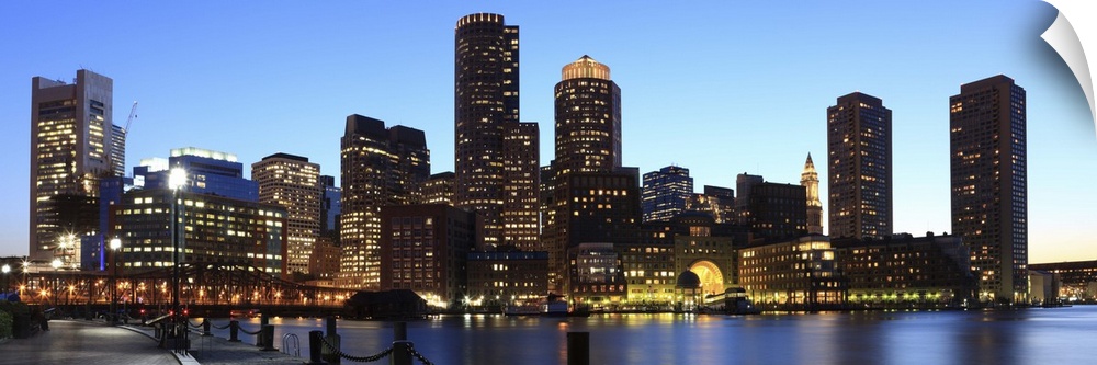Skyline of downtown Boston's financial district from inner Boston Harbor, at dusk
