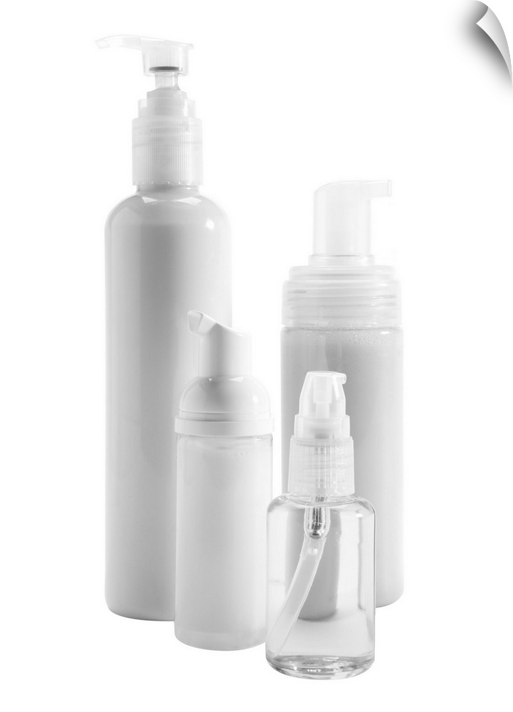 Bottles of skin care products on white background
