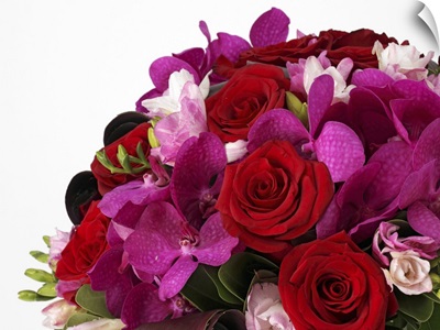 Bouquet of red roses, pink freesias, purple vanda orchids