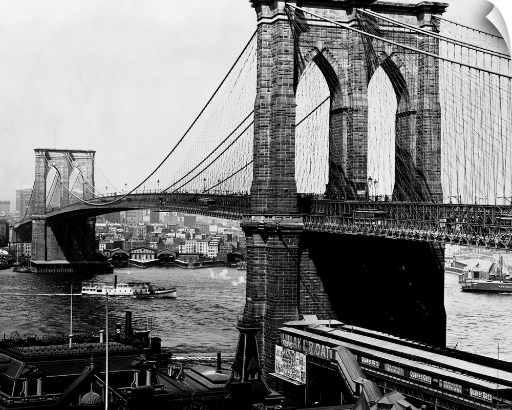A view of the Brooklyn Bridge, an engineering feat. When the bridge was completed in 1883, it was the largest suspension b...