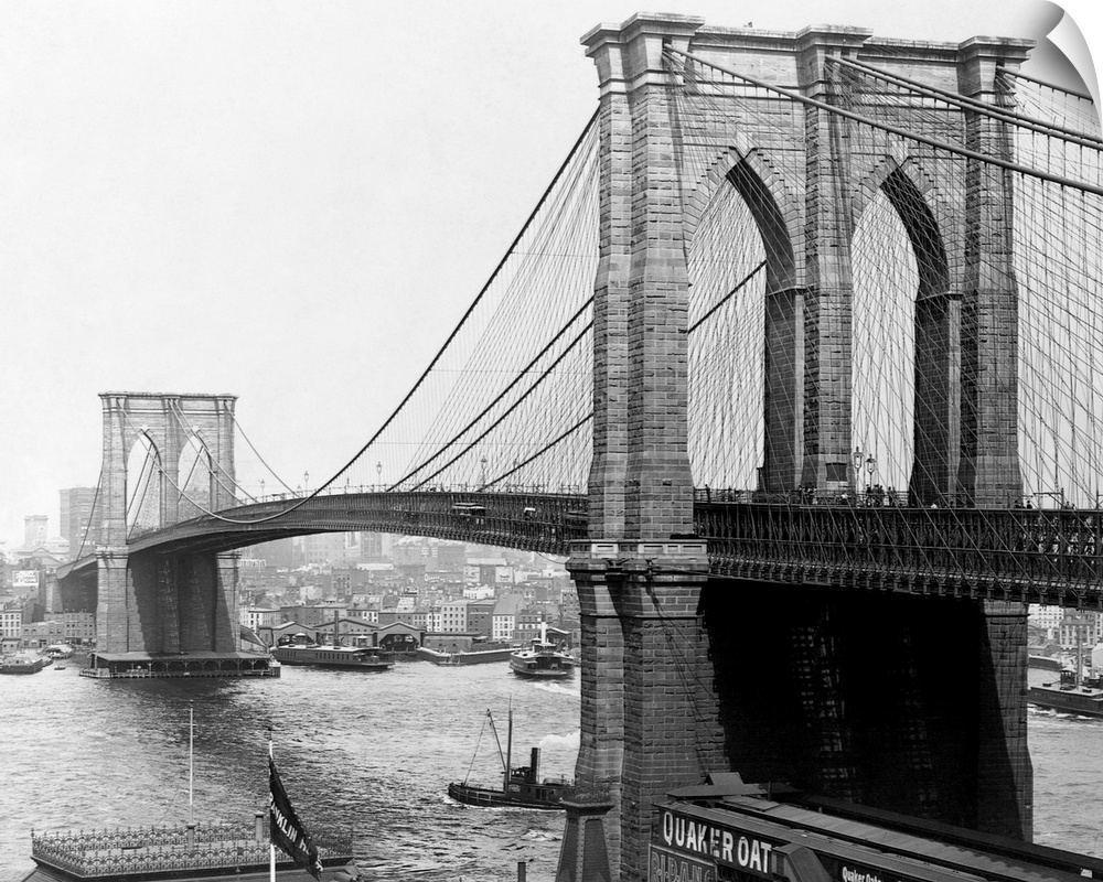 A view of the Brooklyn Bridge which spans across the East River connecting Manhattan Island to Brooklyn. ca. 1900, New Yor...