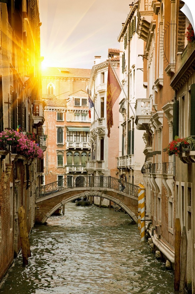 Large portrait wall hanging of buildings and a bridge in a canal in Venice, Italy.
