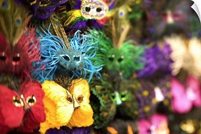 Close-up of colorful miniature masks in a New Orleans souvenier shop.