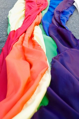 Close-up of gay rights rainbow-colored flag draped across road