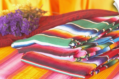 Close-up of multicolored rugs in a store