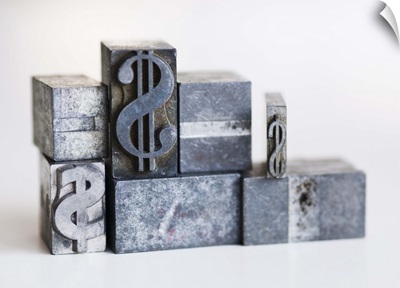Close up of printing blocks with dollar sign