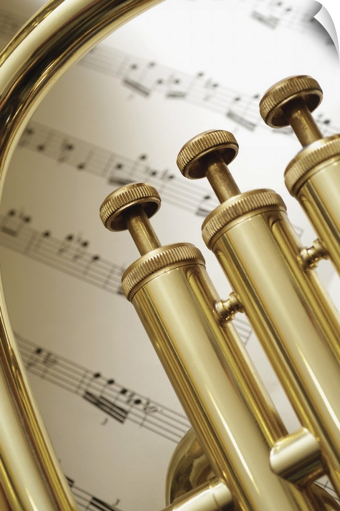 Close-up of trumpet and sheet music