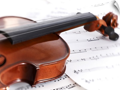 Close up of violin and sheet music