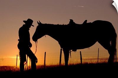 Cowboy Standing With His Horse