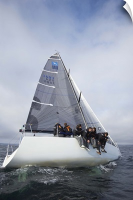 Crew members on racing yacht