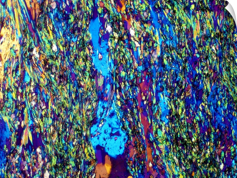 Up-close photograph of colorful translucent stone.