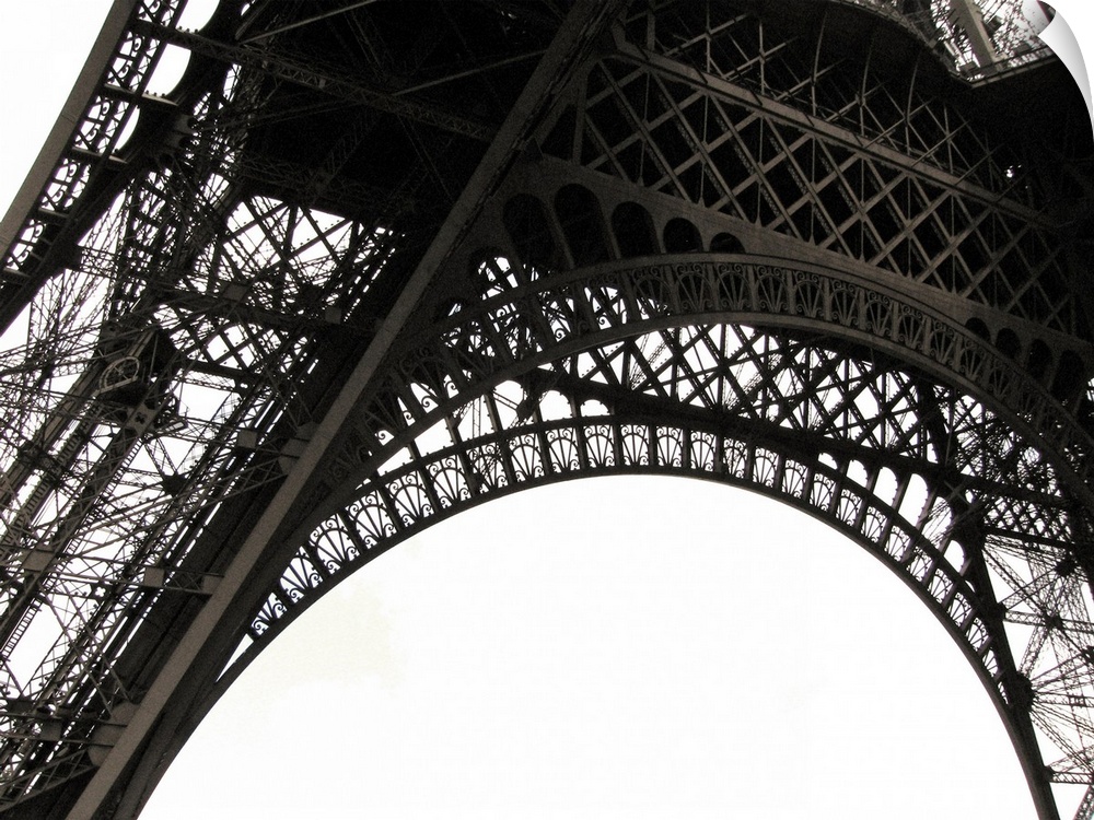 Up-close photograph of architectural detail of iconic monument in Paris.