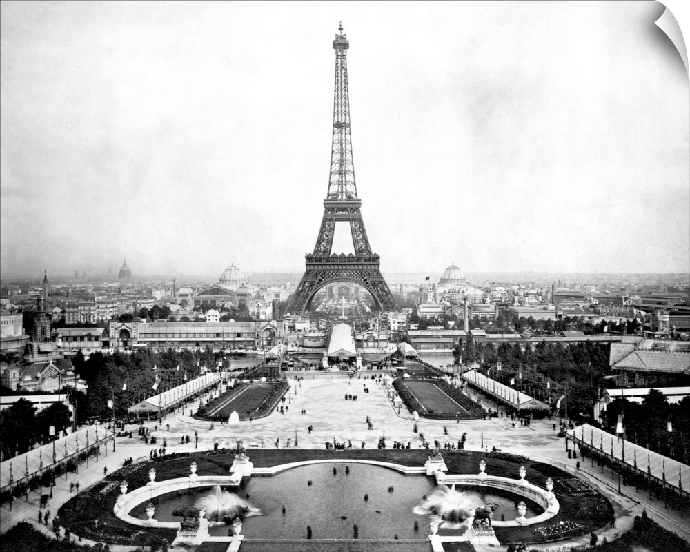 The Eiffel Tower stands overlooking the promenades and fair grounds of the Paris Exposition, 1889 and the city's center. F...