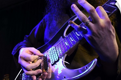 Electric guitar as it is played up on stage